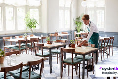 How Many Tables Do Waiters Serve at a Time?